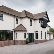 A grand traditional home has been given a contemporary twist with the addition of Matt black Origin products